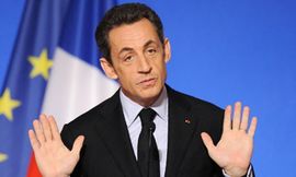 Sarkozi: Evro prejak u odnosu na dolar