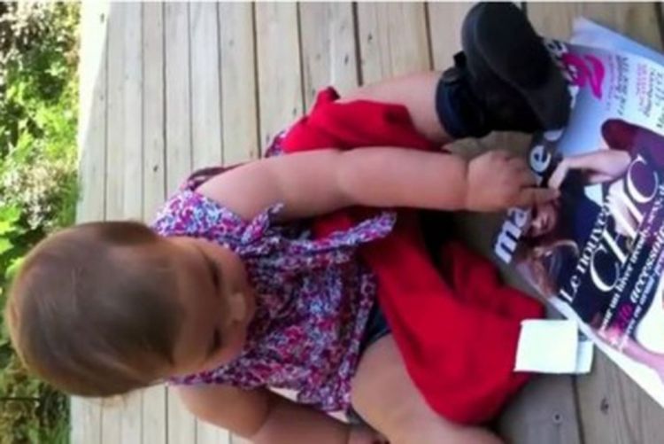 Pogledajte: Beba misli da je časopis pokvareni ajped (Video)