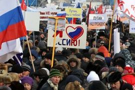Putinove pristalice na mitinzima širom Rusije