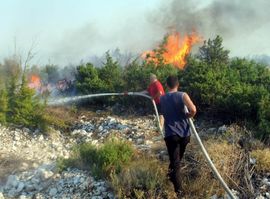 Kiša smirila požare u Konjicu i Srebrenici