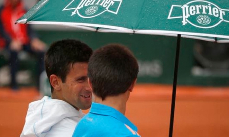 Nole spasao skupljača lopti od kiše