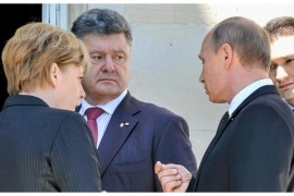 Moguć susret Putina i Porošenka u Berlinu