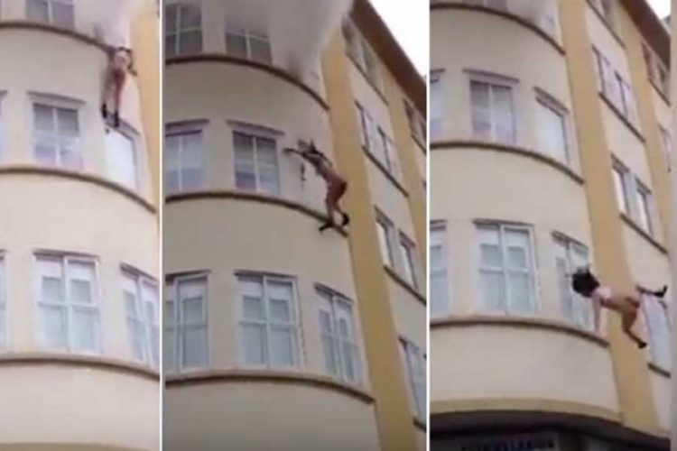 Bježeći od vatre gola žena pala sa trećeg sprata (VIDEO)