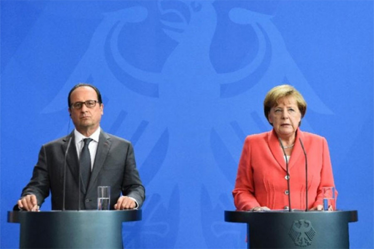 Oland-Merkel: Neprihvatljivi komentari Turske