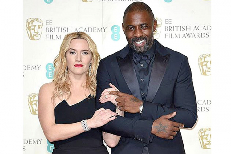 Kejt Vinslet i Idris Elba u filmu "Planina koja nas razdvaja"