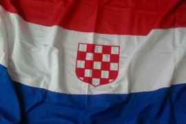 Ustaška zastava na ulazu u crkvu u selu Otišić