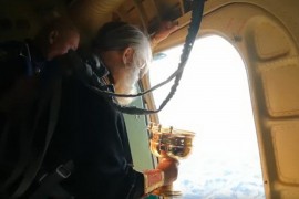 Sveštenik iz aviona osveštao grad